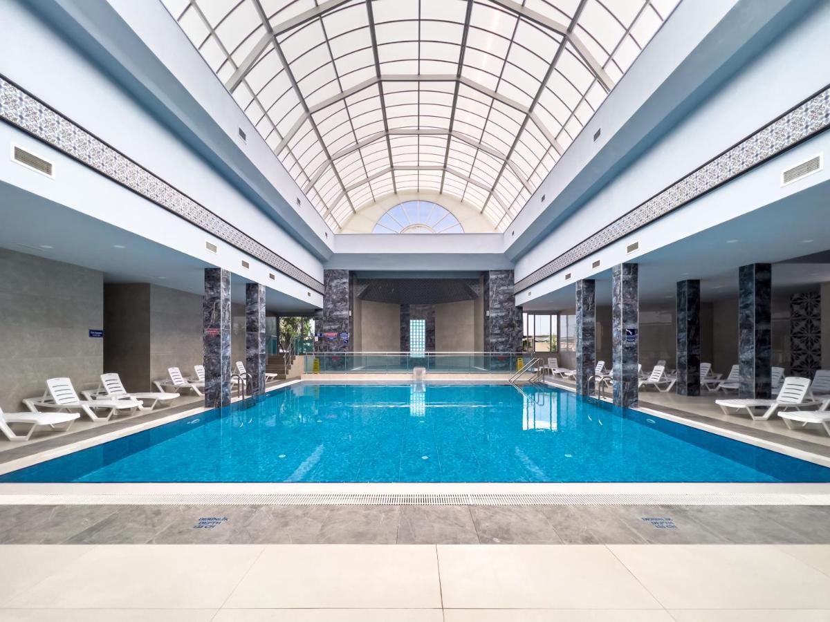 Spa Hotel Colossae Thermal Karahayit  Exterior photo The pool at the hotel
